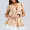 Imani mini-jurk van geplooid katoen met honingbloemenprint