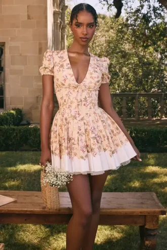 Imani mini-jurk van geplooid katoen met honingbloemenprint