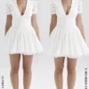 Imani witte geplooide mini-jurk met broderie anglaise