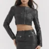 Ione Zwarte veganistische leren cropped top