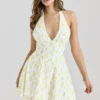 Iris Lemon mini-jurk met bloemenprint van georgette en halternek