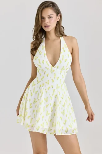 Iris Lemon mini-jurk met bloemenprint van georgette en halternek