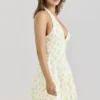 Iris Lemon mini-jurk met bloemenprint van georgette en halternek