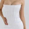 Isis ivoorkleurige satijnen corset maxi-jurk