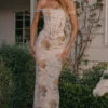 Isis zachtblauwe maxi-jurk met vintage print en korset