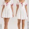 Jana witte mini-jurk met pofmouwen en broderie anglaise