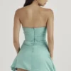 Jasmine Jade gedrapeerde strapless korsettenjurk