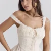 Jean Vintage crèmekleurige katoenen peplumtop met broderie anglaise
