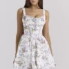 Kimmie witte katoenen mini-jurk met bloemenprint en strik
