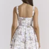 Kimmie witte katoenen mini-jurk met bloemenprint en strik