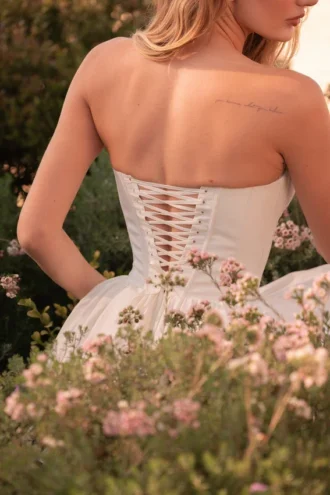 Kristiana ivoorkleurige katoenen strapless korsetminijurk