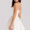 Kristiana ivoorkleurige katoenen strapless korsetminijurk