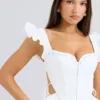 Lilibet Witte geborduurde katoenen peplum-korsettentop