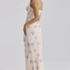Lini ivoorkleurige maxi-jurk van stretch mesh met Sweet Peony-print
