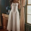 Liora witte katoenen midi-zomerjurk met broderie anglaise-rand