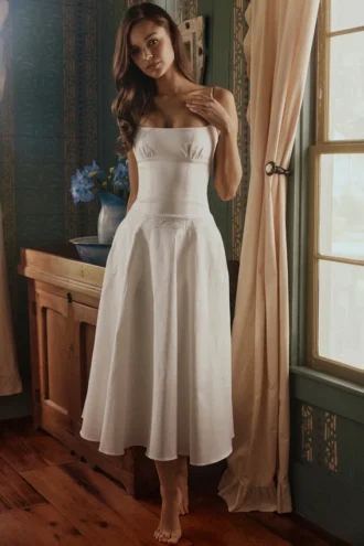 Liora witte katoenen midi-zomerjurk met broderie anglaise-rand