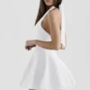 Loulette witte mini-jurk met halternek en strikken