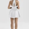 Loulette witte mini-jurk met halternek en strikken