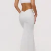 Lyra witte katoenen maxi-rok met V-rug en drapering