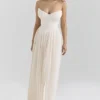 Marcella ivoorkleurige georgette maxi-jurk met plooien