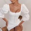 Matilda witte korsetjurk met pofmouwen
