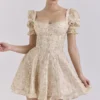 Melita Crème Mini-jurk met bloemenprint en pofmouwen van chiffon
