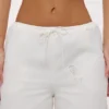 Mirea witte katoenen broek met brede pijpen en broderie anglaise
