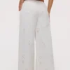 Mirea witte katoenen broek met brede pijpen en broderie anglaise