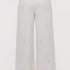 Mirea witte katoenen broek met brede pijpen en broderie anglaise