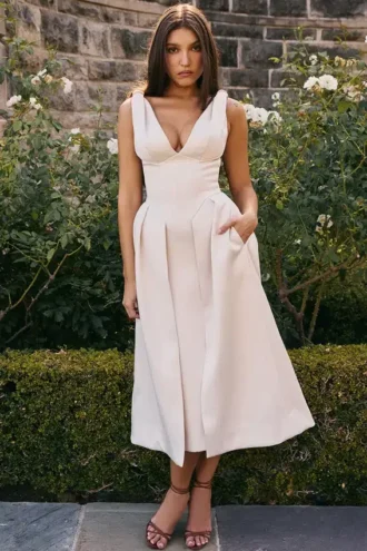 Paloma Vintage crèmekleurige satijnen midi-jurk met plooien