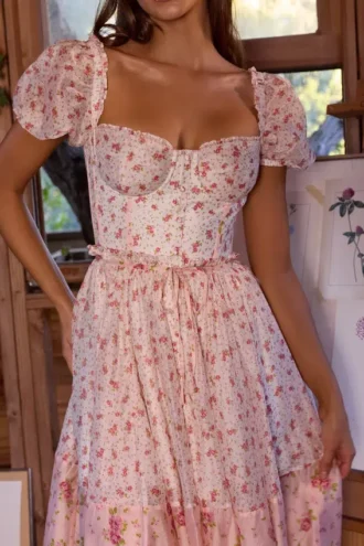 Penelope witte midi-jurk met rozenprint en georgette lint