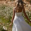 Perle witte midi-jurk met kanten rand