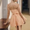 Rosalinda perzikkleurige jacquard mini-jurk met strikken