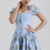 Rosie blauwe katoenen mini-jurk met rozenprint