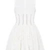 Sarita witte katoenen mini-jurk met broderie anglaise en diepe halslijn