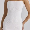 Serenella witte midi-jurk met broderie anglaise-kant