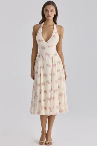 Solada ivoorkleurige midi-halterjurk van georgette met vintage rozenprint