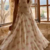 Solada ivoorkleurige midi-halterjurk van georgette met vintage rozenprint