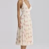 Solada ivoorkleurige midi-halterjurk van georgette met vintage rozenprint