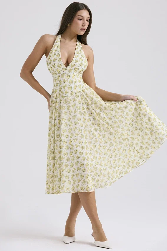 Solada ivoorkleurige vintage halterjurk met bloemenprint van georgette