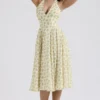 Solada ivoorkleurige vintage halterjurk met bloemenprint van georgette