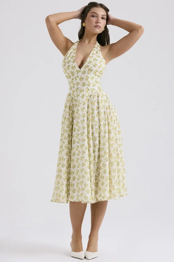 Solada ivoorkleurige vintage halterjurk met bloemenprint van georgette