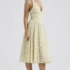 Solada ivoorkleurige vintage halterjurk met bloemenprint van georgette