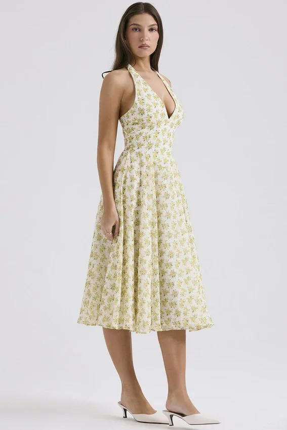 Solada ivoorkleurige vintage halterjurk met bloemenprint van georgette