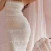 Solana ivoorkleurige maxi-jurk met pailletten en plooien