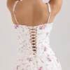 Steffani witte stretch katoenen midi-zomerjurk met rozenprint