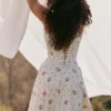 Steffani witte stretch katoenen midi-zomerjurk met rozenprint