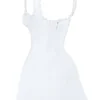 Tilly witte mini-jurk met plooitjes