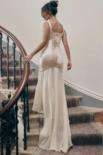 Vittoria champagnekleurige chiffon avondjurk tot op de grond