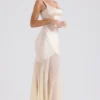 Vittoria champagnekleurige chiffon avondjurk tot op de grond